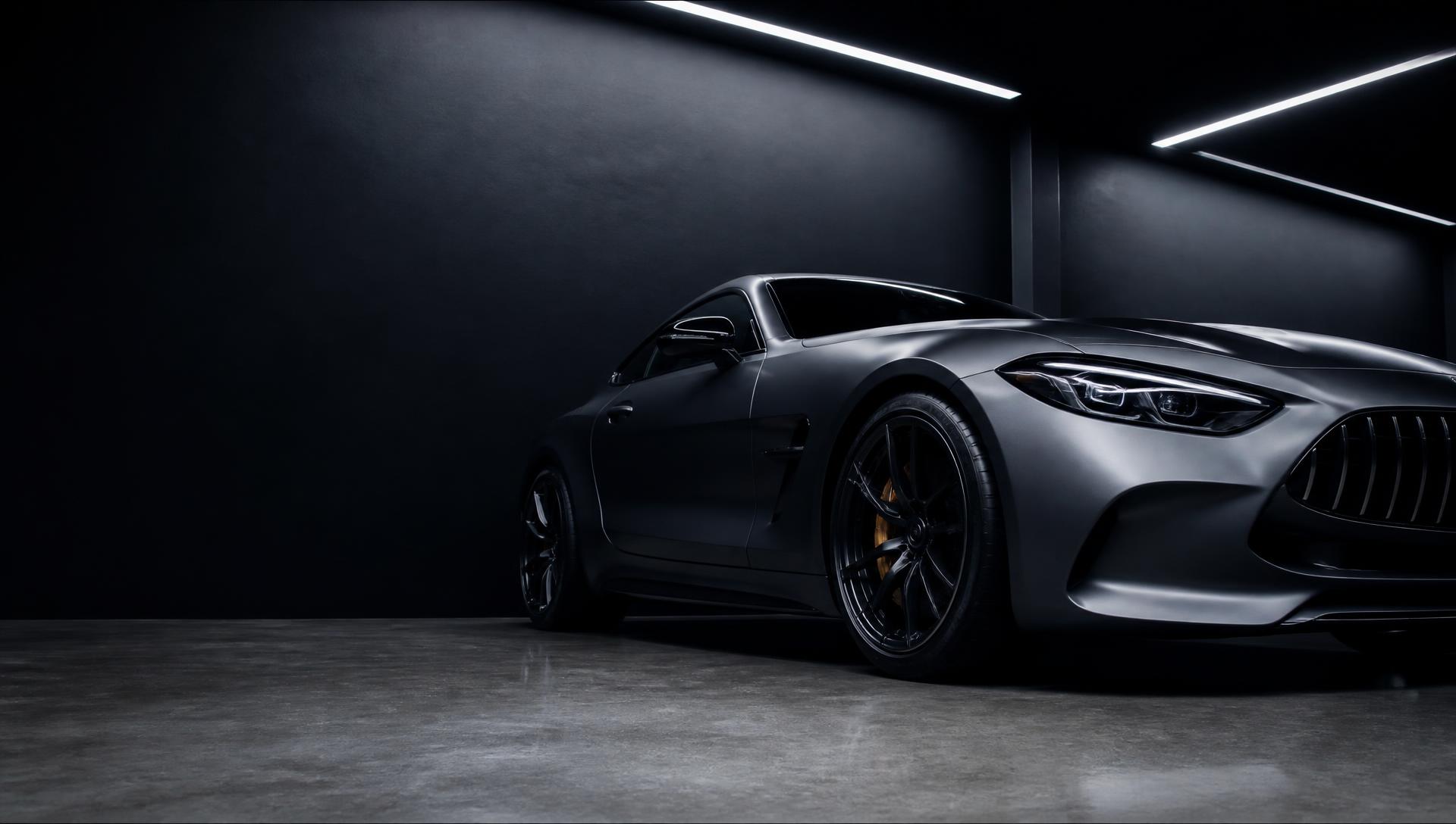 Satin graphite wrapped sports car inside the Prestige Auto Lab install bay in Glenview